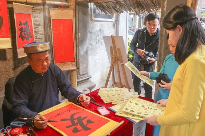 tai hien cac nghi le tet co truyen tai pho co ha noi hinh 3