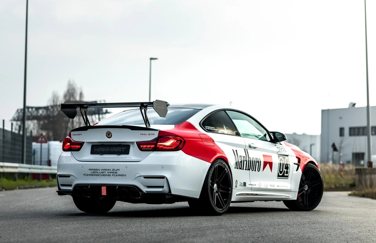 bmw m4 dtm champion edition manhart ra mat manh hon 700 ma luc hinh 2