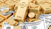 Giá vàng giảm, đồng USD tiếp tục tăng