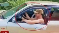 Xử phạt trường hợp dạy lái khi cửa xe để mở và 2 người cùng ngồi trên một ghế lái