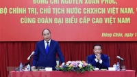 Chủ tịch nước gặp gỡ đại diện cộng đồng và doanh nghiệp Việt Nam tại Lào