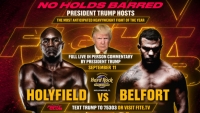 Tay đấm huyền thoại Evander Holyfield đấu với Vitor Belfort trước sự chứng kiến của Donald Trump