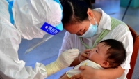 Trung Quốc chạy đua với Covid-19 để ngăn lây nhiễm của học sinh