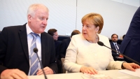 Thỏa thuận của bà Merkel còn chờ đảng CDU và EU chấp thuận