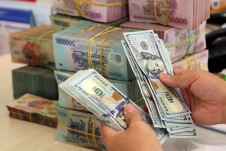 Đồng tiền Việt Nam vẫn thuộc nhóm ít mất giá nhất so với khu vực và thế giới