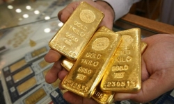Giá vàng có thể hướng đến vùng 1.900 USD/oune