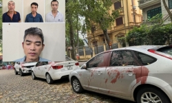 Khởi tố 4 người trong vụ tạt sơn ô tô ở Hà Nội